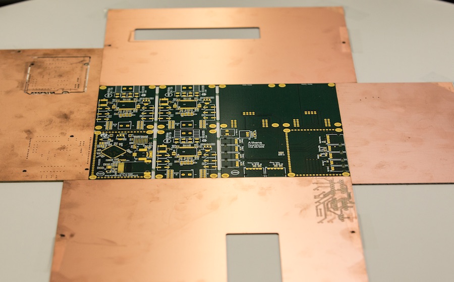 fixing the board to a table using scrap PCB pieces