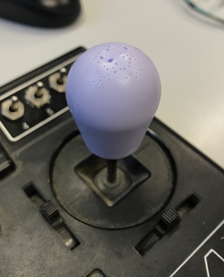 The grip mounted on one of the joysticks